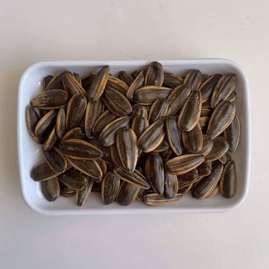 Semi di girasole cinesi all'ingrosso non OGM di alta qualità a buon prezzo sia crudi che arrostiti